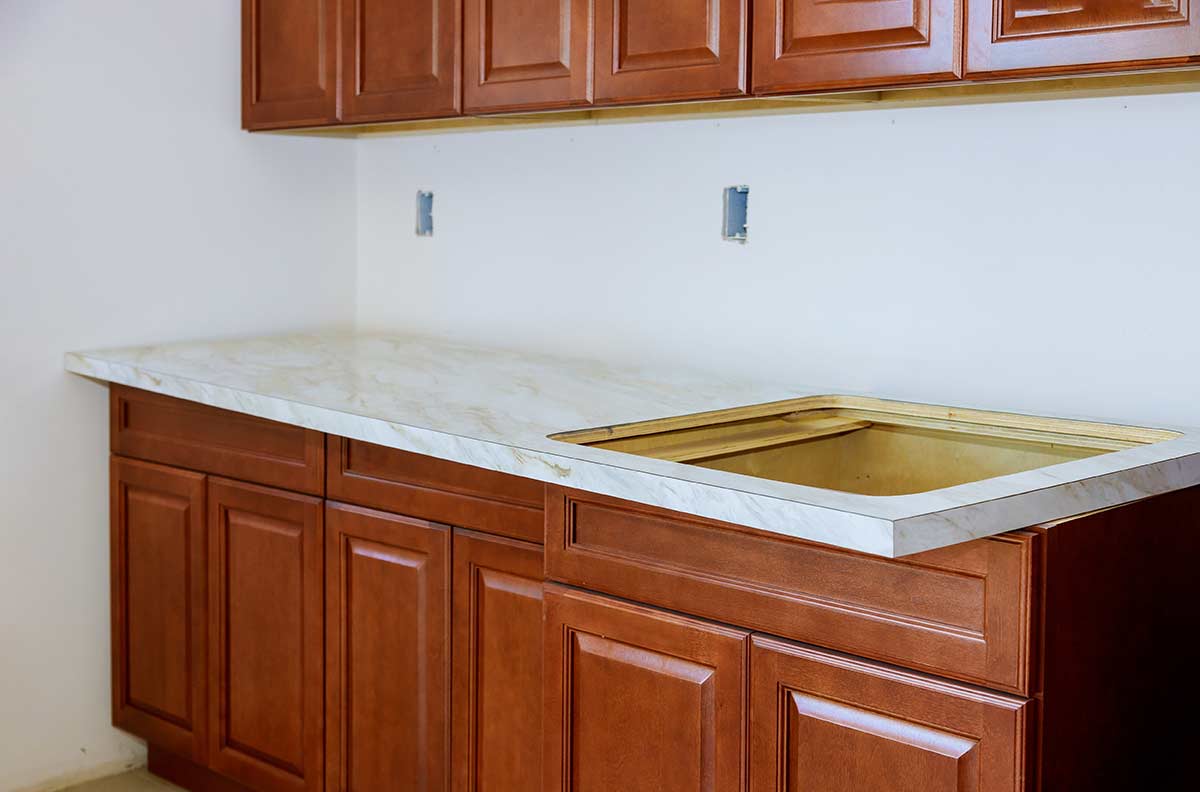 Damages on the cabinets & countertops – what to do?
