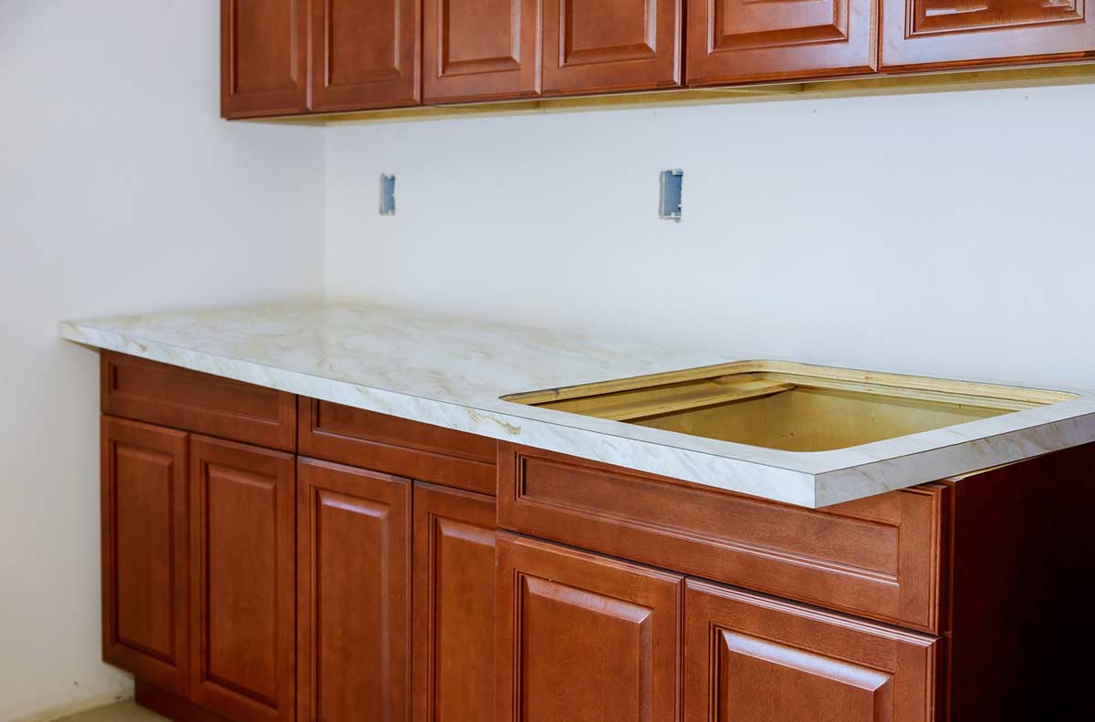 Why is it nearly impossible to squeeze the old cabinets into your new home?